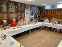 Ladies seated enjoying lunch