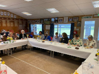 Ladies seated enjoying lunch