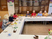 Ladies seated enjoying lunch